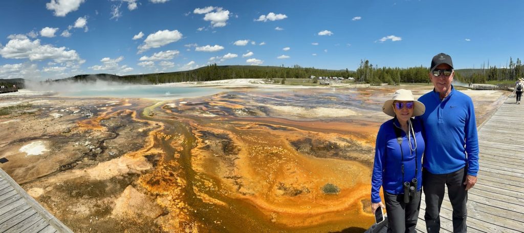 why is Yellowstone National Park important geothermal boardwalk with visitors